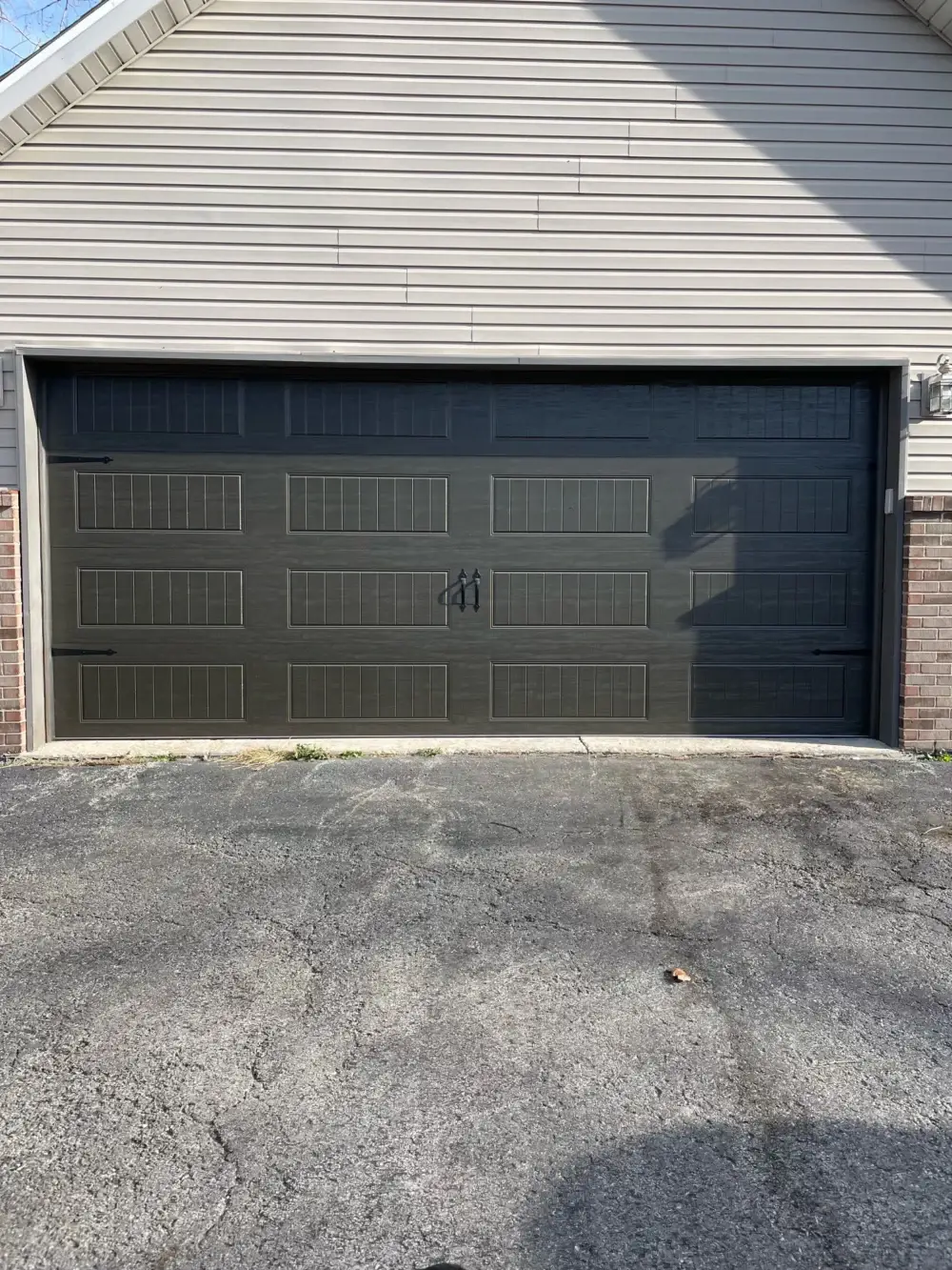 garage door designs with a brick wall